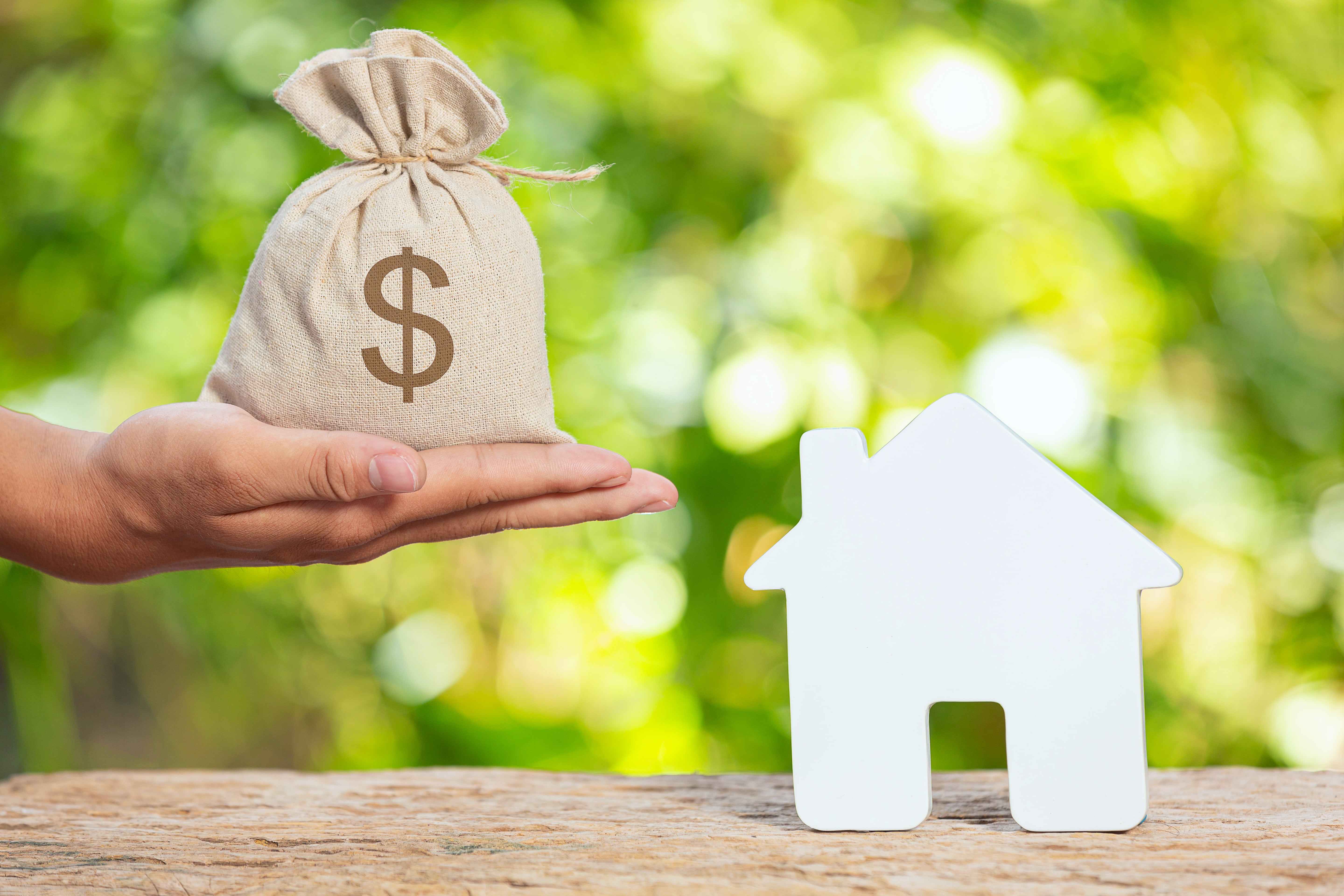 World Habitat Day Close Up Picture Sack Coins Model House Min